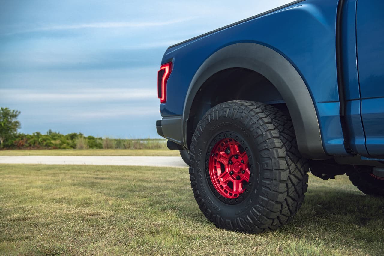 Rear view of 2019 Ford F150 Raptor with truck suv wheels