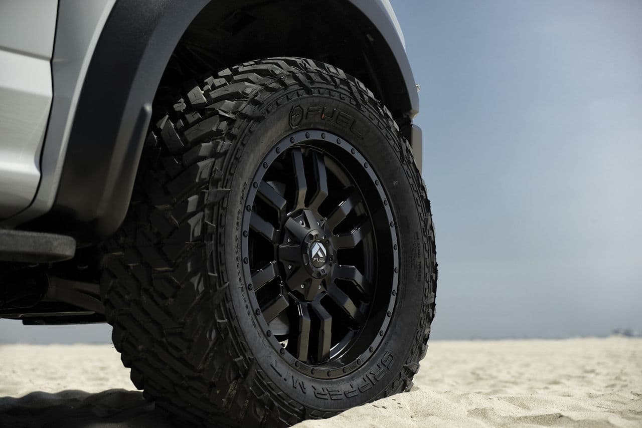 Rear view of 2019 Ford F150 Raptor with truck suv wheels