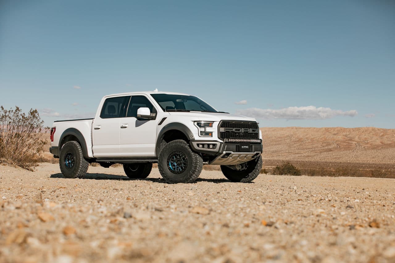 Front view of 2019 Ford F150 Raptor with vehicle wraps