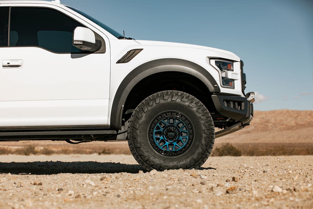 Rear view of 2019 Ford F150 Raptor with vehicle wraps
