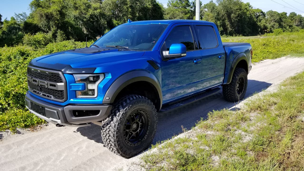 Side profile of 2019 Ford F150 Raptor with wheels
