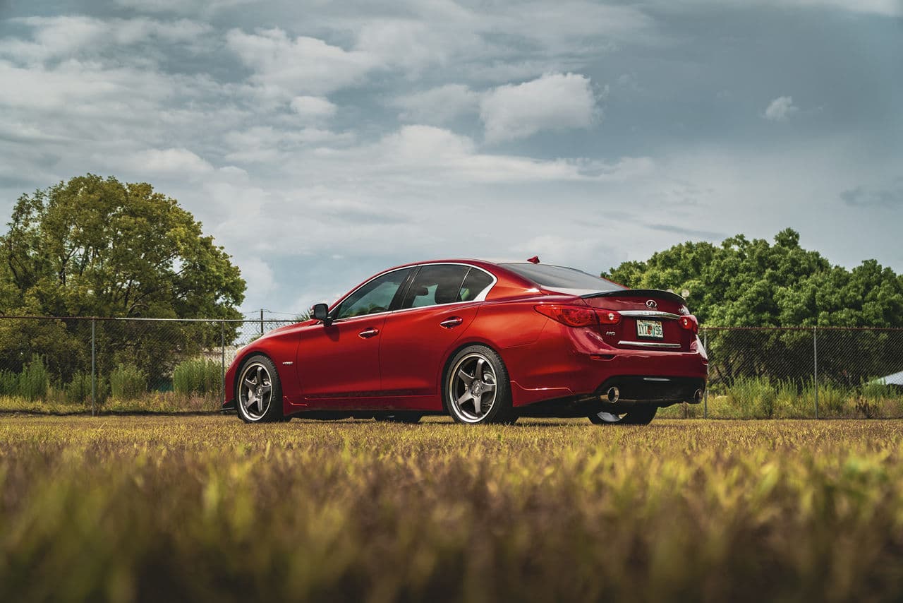 Rear view of 2019 Infiniti Q50S with vehicle wraps