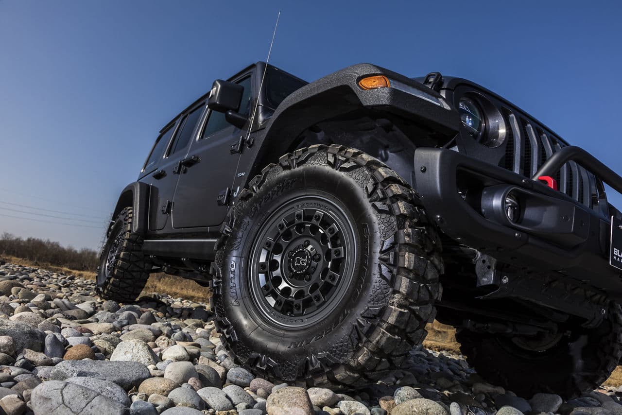 Rear view of 2019 Jeep Wrangler with truck suv wheels