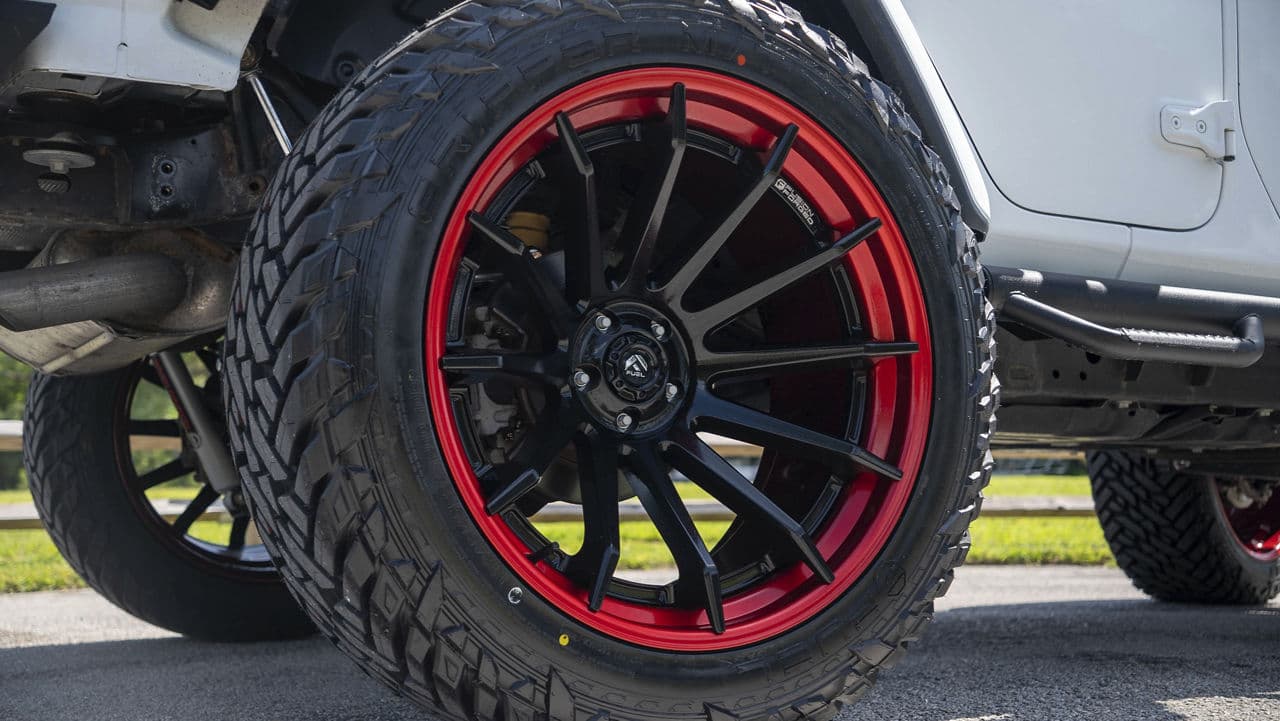 Detail view of 2019 Jeep Wrangler Unlimited Sport with wheels