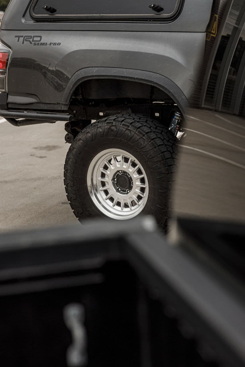 Side profile of 2019 Toyota Tacoma with wheels