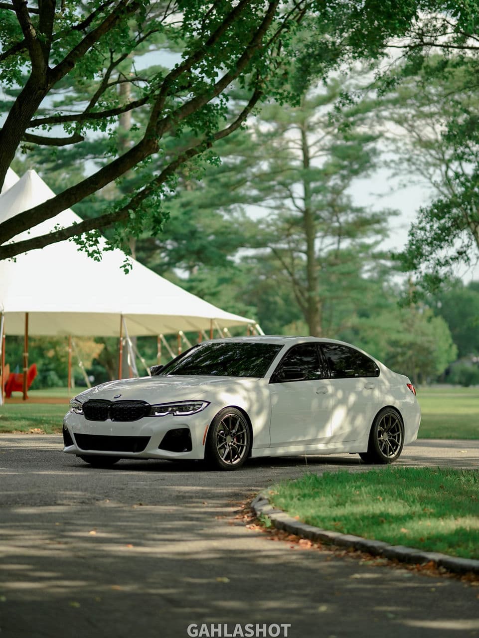 Side profile of 2020 BMW M340i with wheels