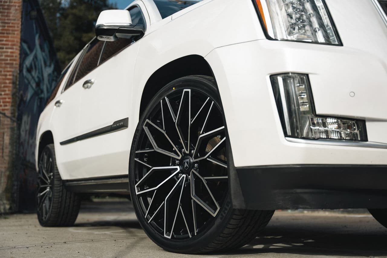 Side profile of 2020 Cadillac Escalade with truck suv wheels