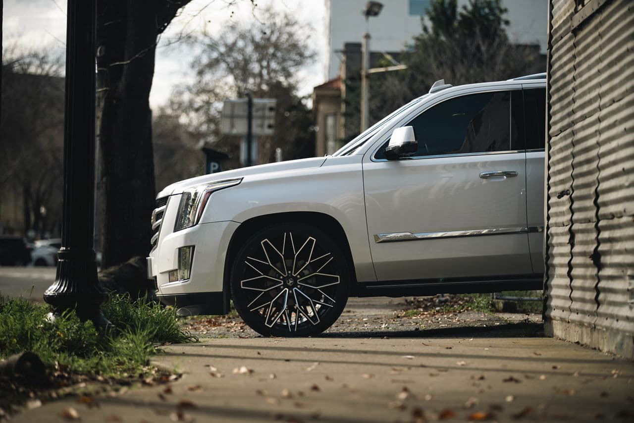 Rear view of 2020 Cadillac Escalade with truck suv wheels