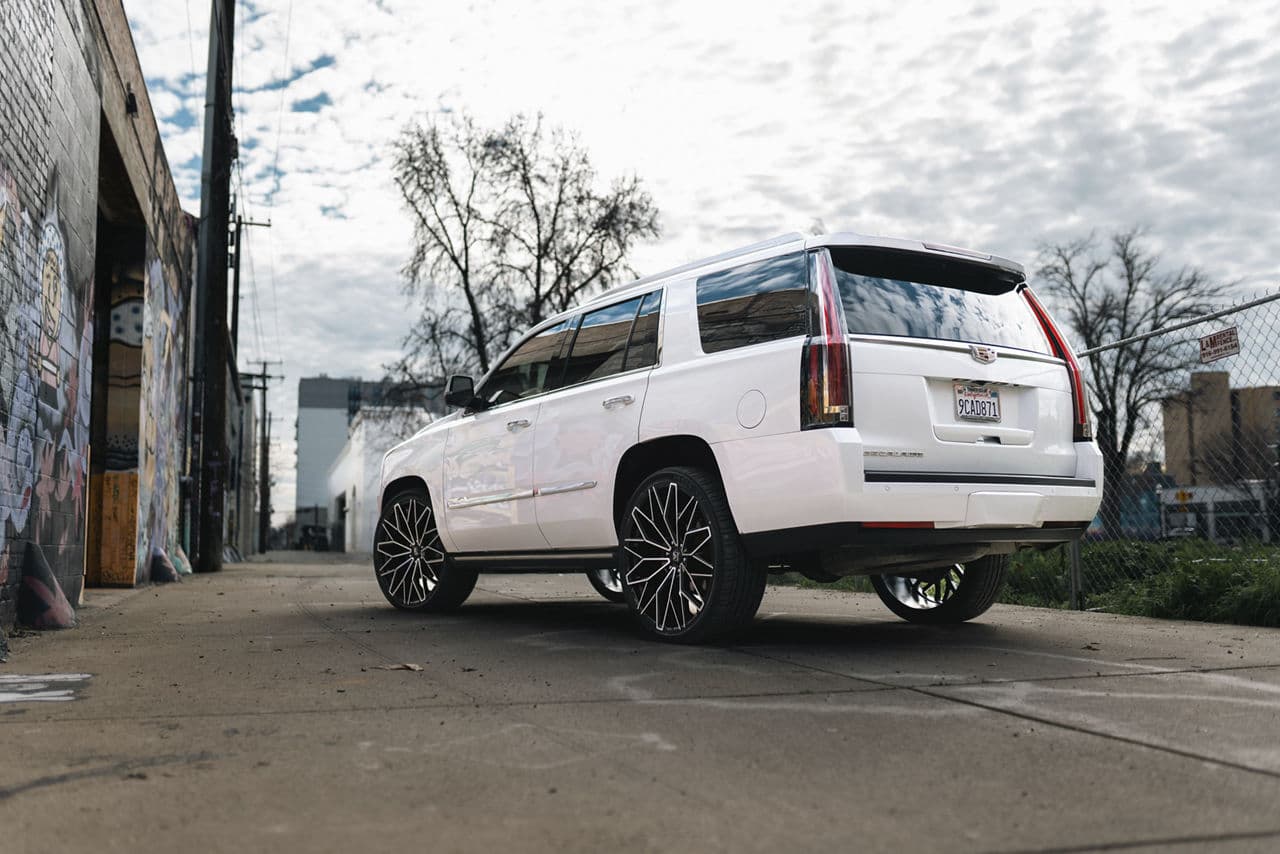 Detail view of 2020 Cadillac Escalade with truck suv wheels