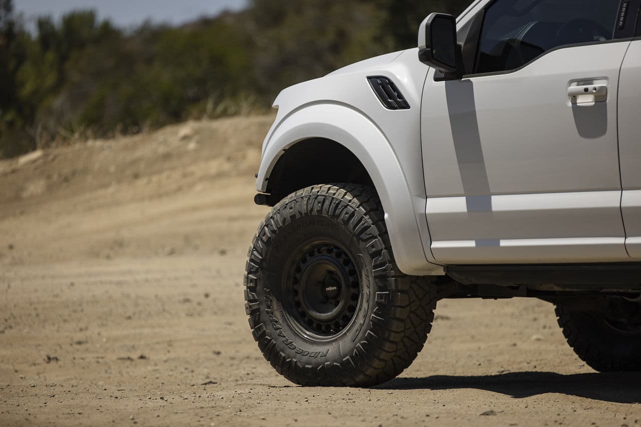 Detail view of 2020 Ford F150 Raptor with truck suv wheels