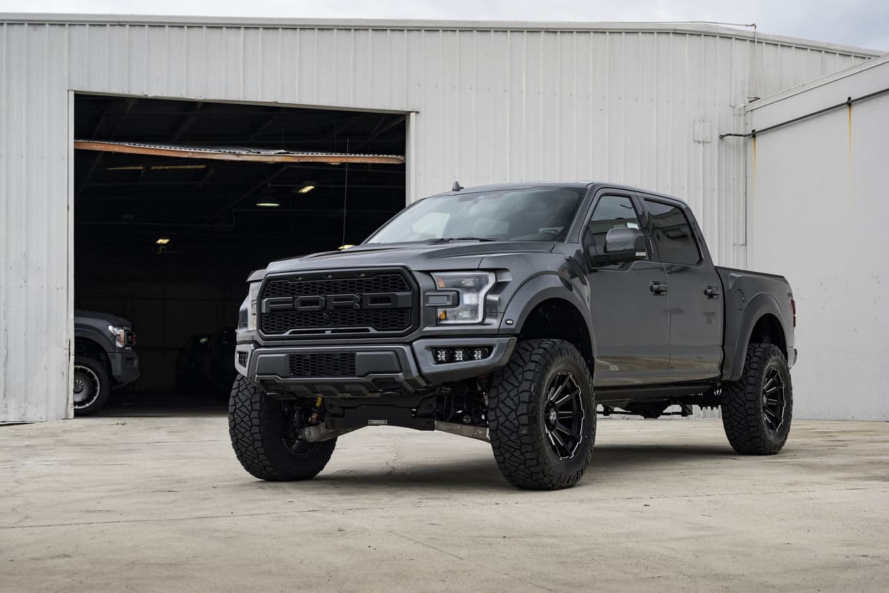 Front view of 2020 Ford F150 Raptor with truck suv wheels