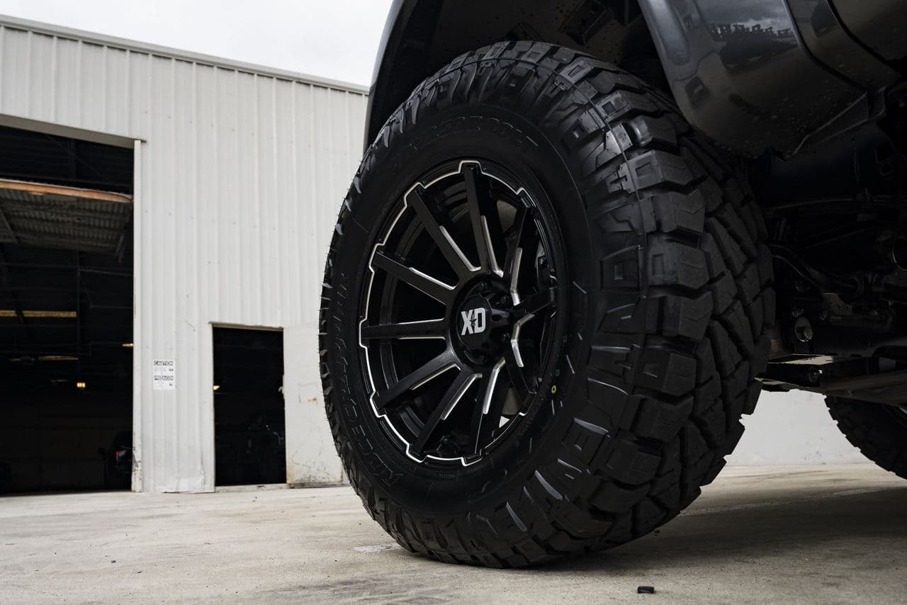 Side profile of 2020 Ford F150 Raptor with truck suv wheels