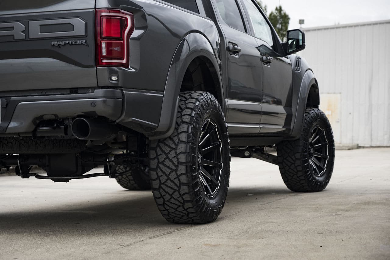 Rear view of 2020 Ford F150 Raptor with truck suv wheels