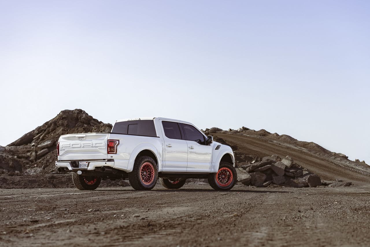 Side profile of 2020 Ford F150 Raptor with vehicle wraps