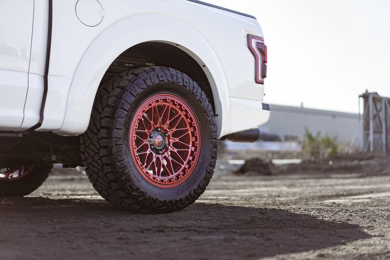 Rear view of 2020 Ford F150 Raptor with vehicle wraps
