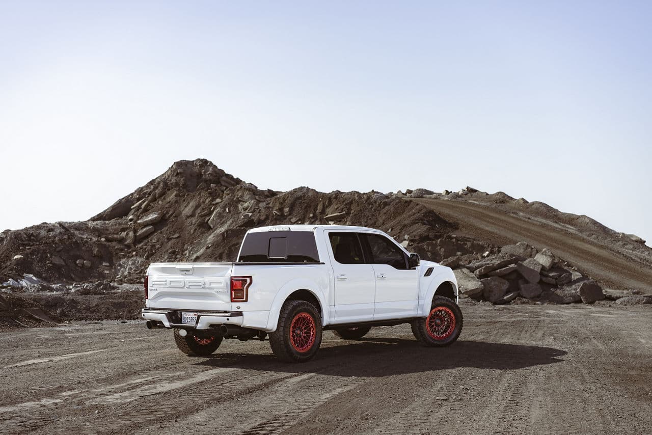 Detail view of 2020 Ford F150 Raptor with vehicle wraps
