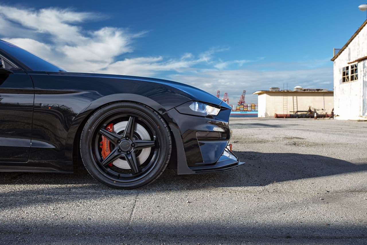 Rear view of 2020 Ford Mustang with wheels