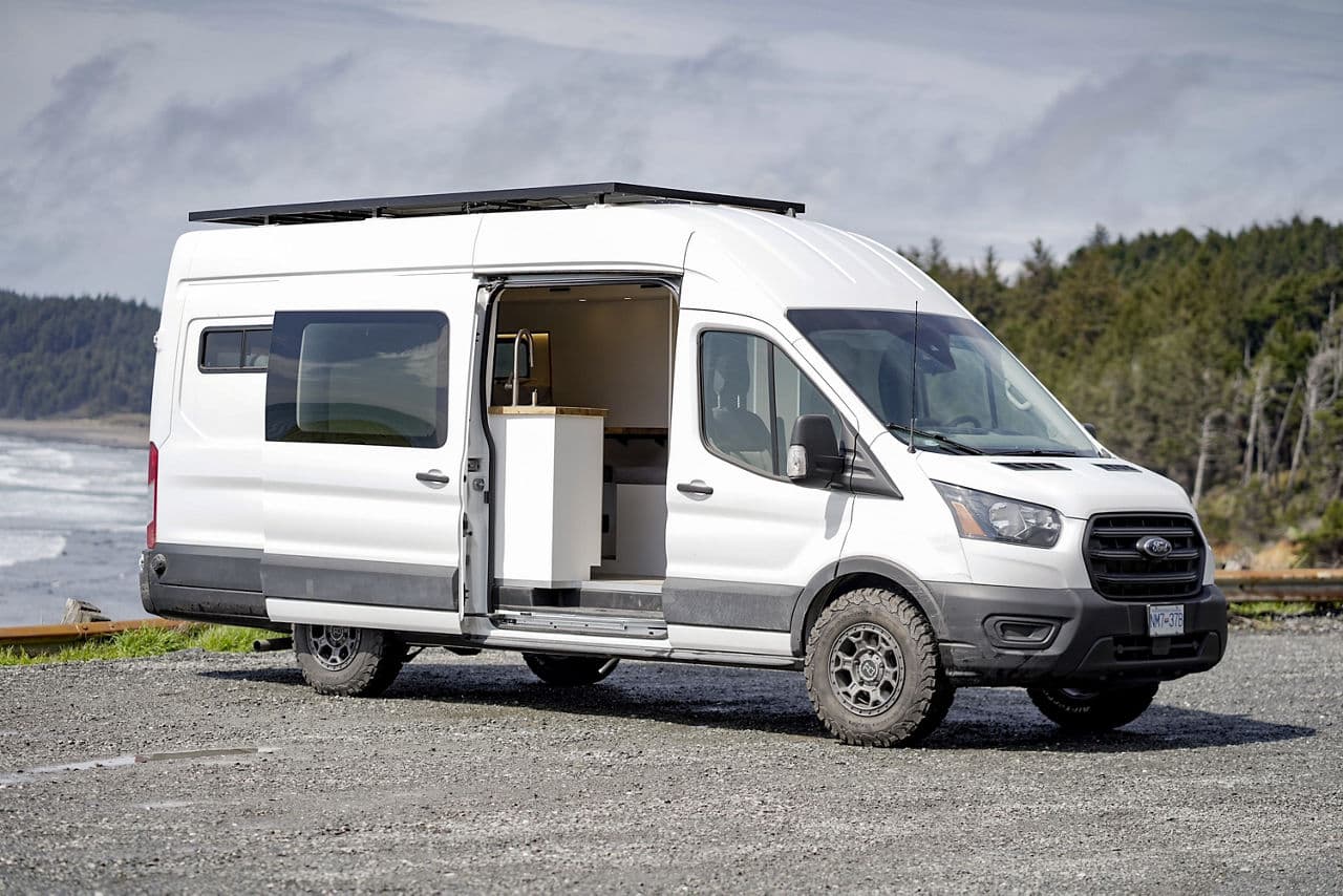 Side profile of 2020 Ford Transit with wheels