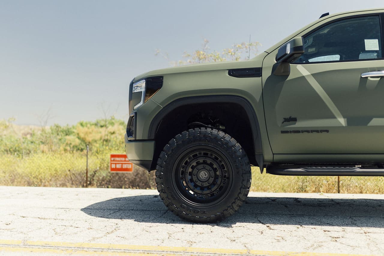 Side profile of 2020 GMC Sierra Denali with wheels
