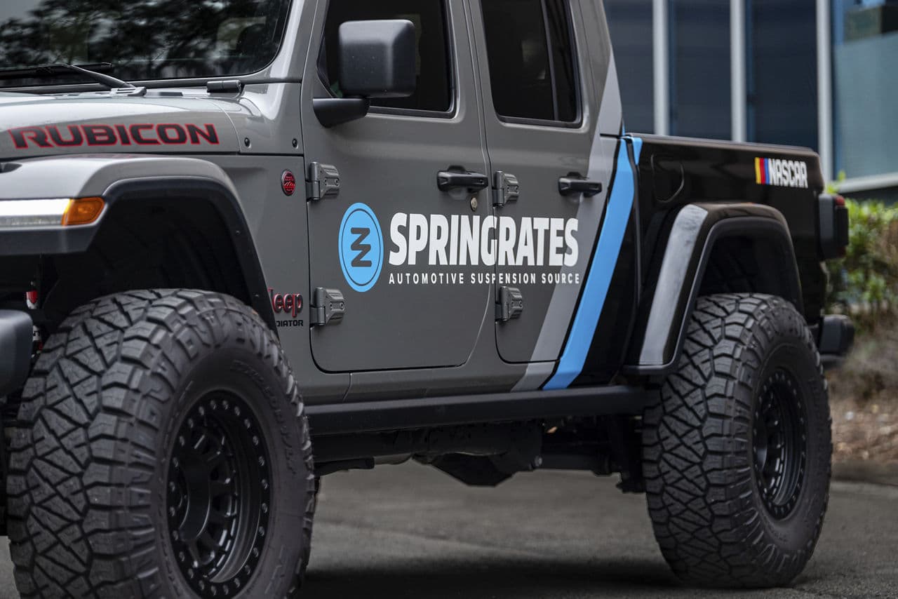 Rear view of 2020 Jeep Gladiator with truck suv wheels