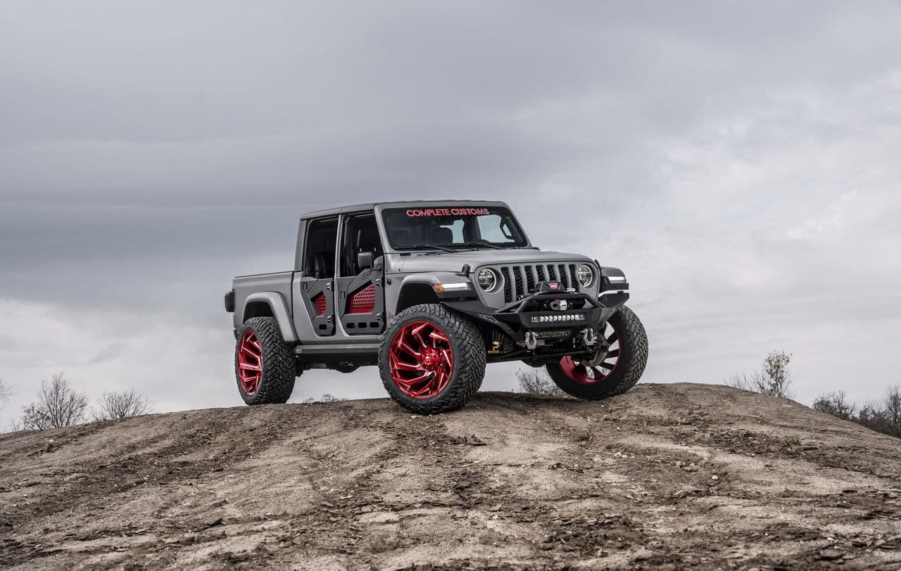 Rear view of 2020 Jeep Gladiator with truck suv wheels