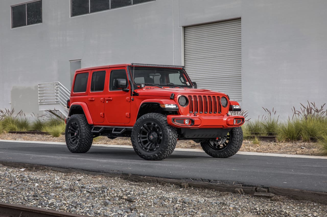 Front view of 2020 Jeep Wrangler Sahara with truck suv wheels