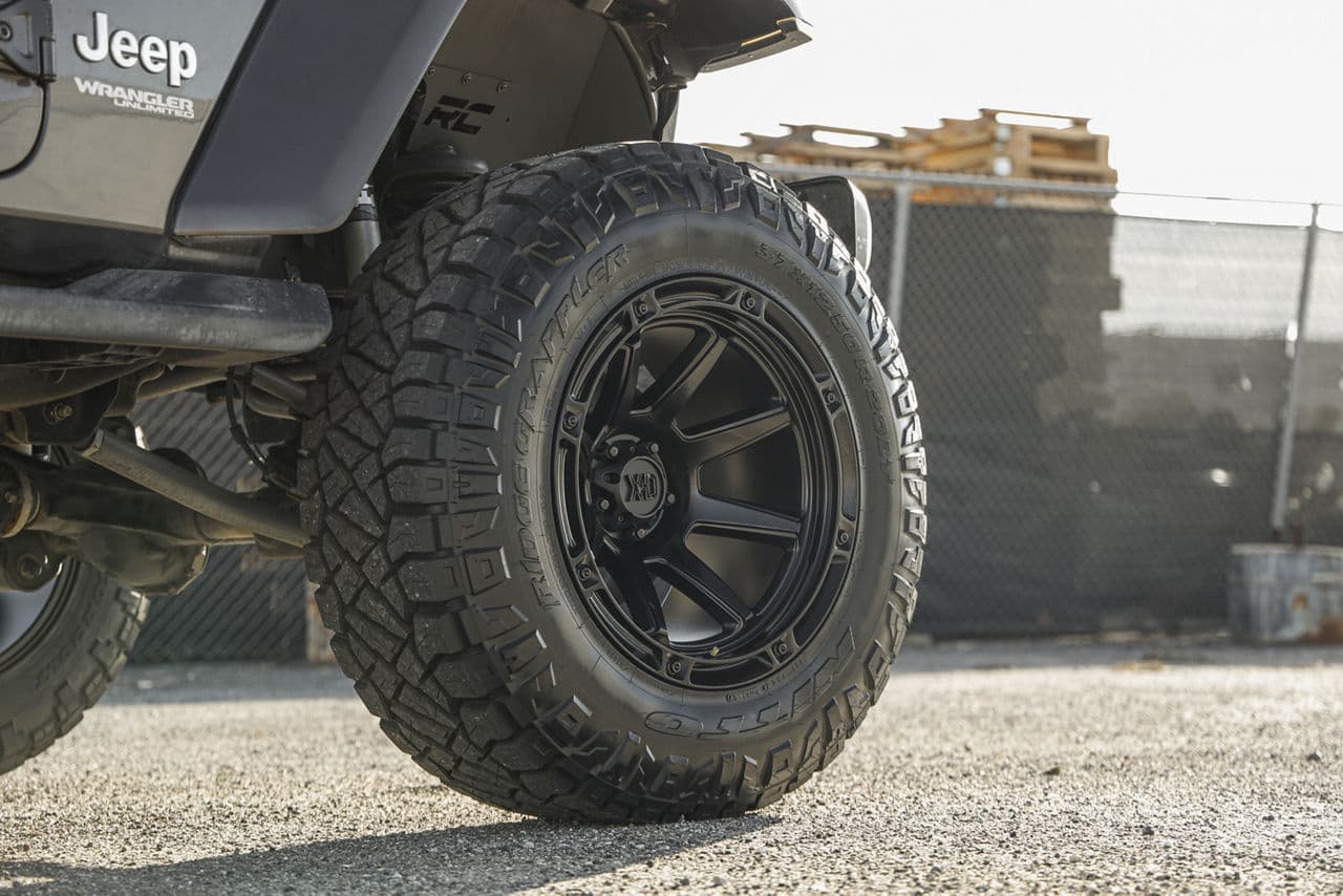 Rear view of 2020 Jeep Wrangler Sahara with wheels