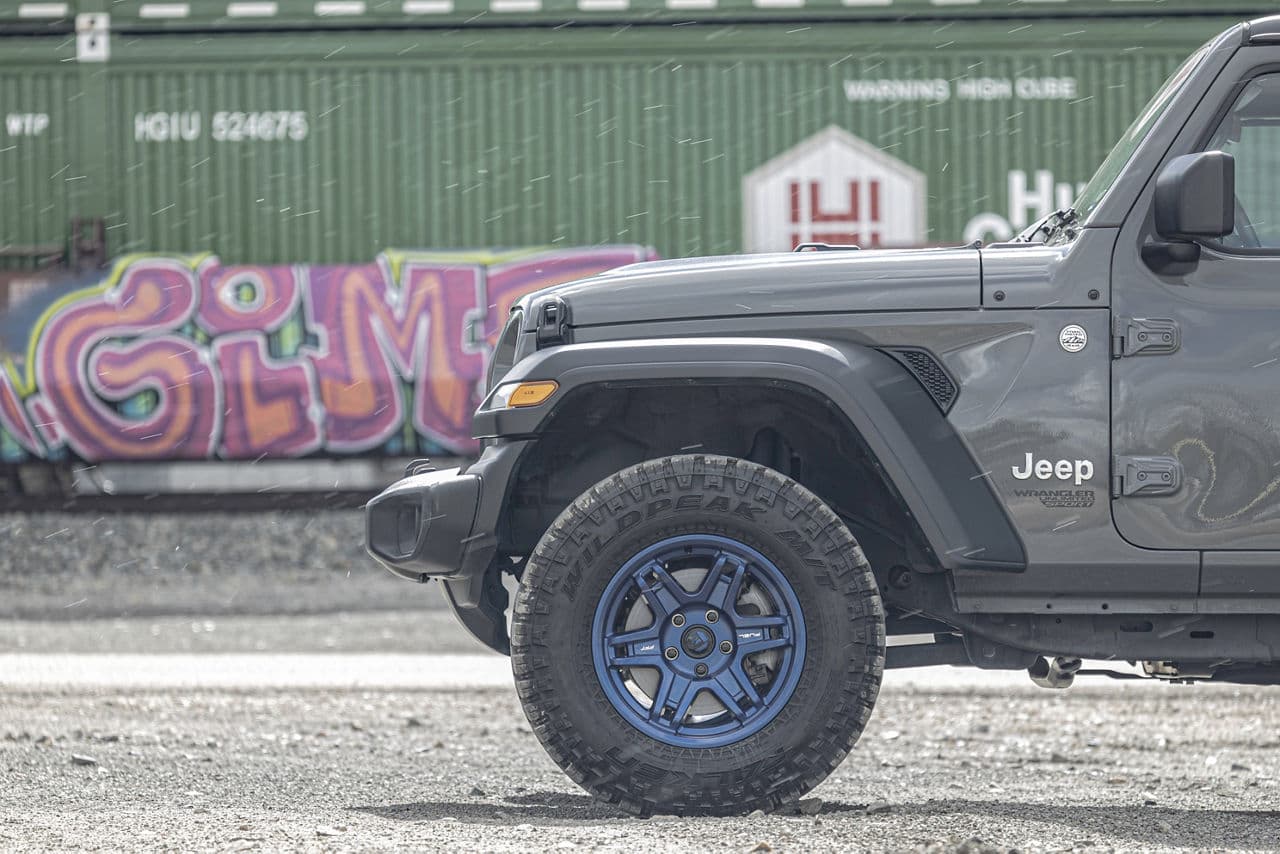 Rear view of 2020 Jeep Wrangler with vehicle wraps