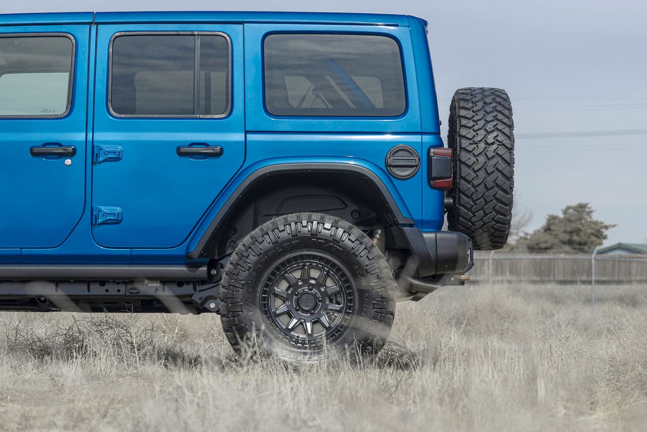 Side profile of 2020 Jeep Wrangler with wheels