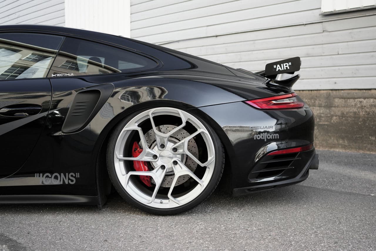 Rear view of 2020 Porsche 911 Turbo with wheels