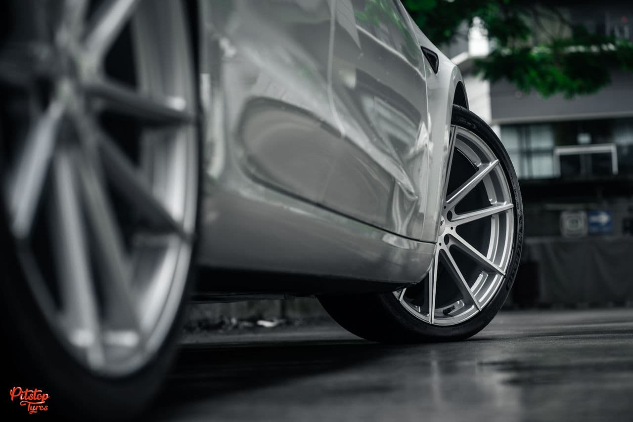 Detail view of 2020 Tesla Model 3 with wheels