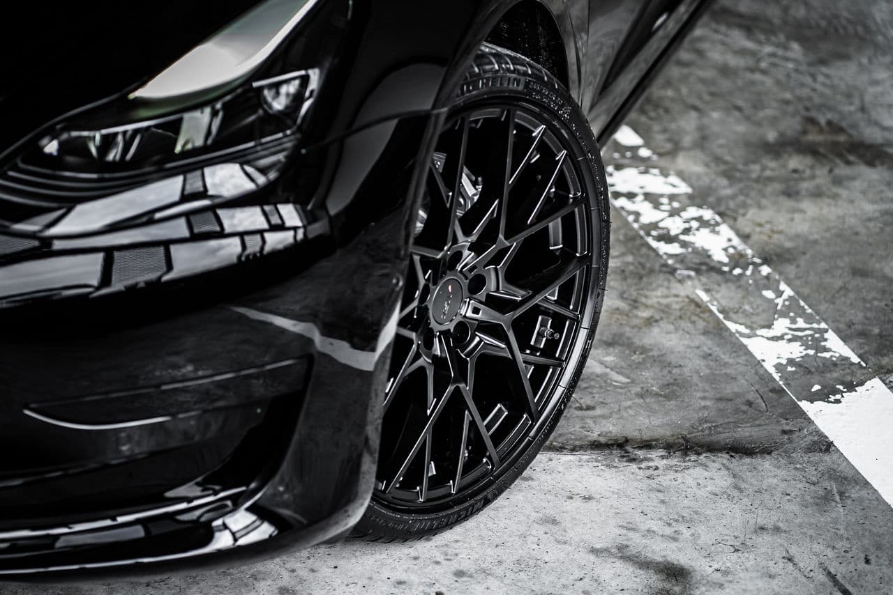 Detail view of 2020 Tesla Model 3 with wheels