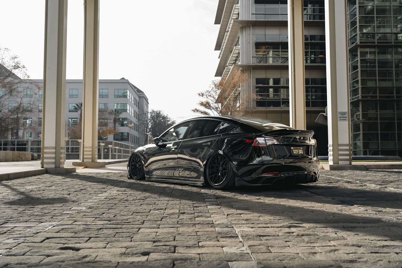 Front view of 2020 Tesla Model 3 with wheels