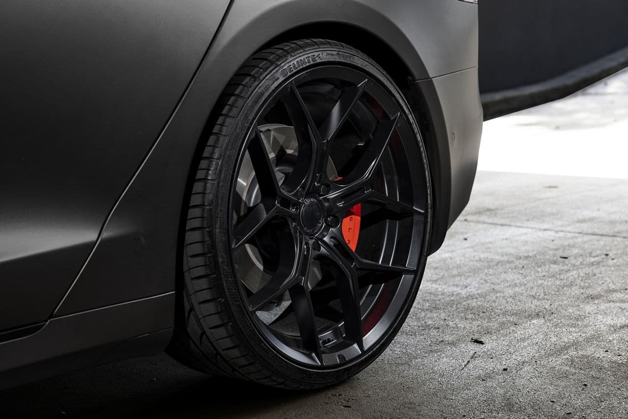 Rear view of 2020 Tesla Model S with wheels