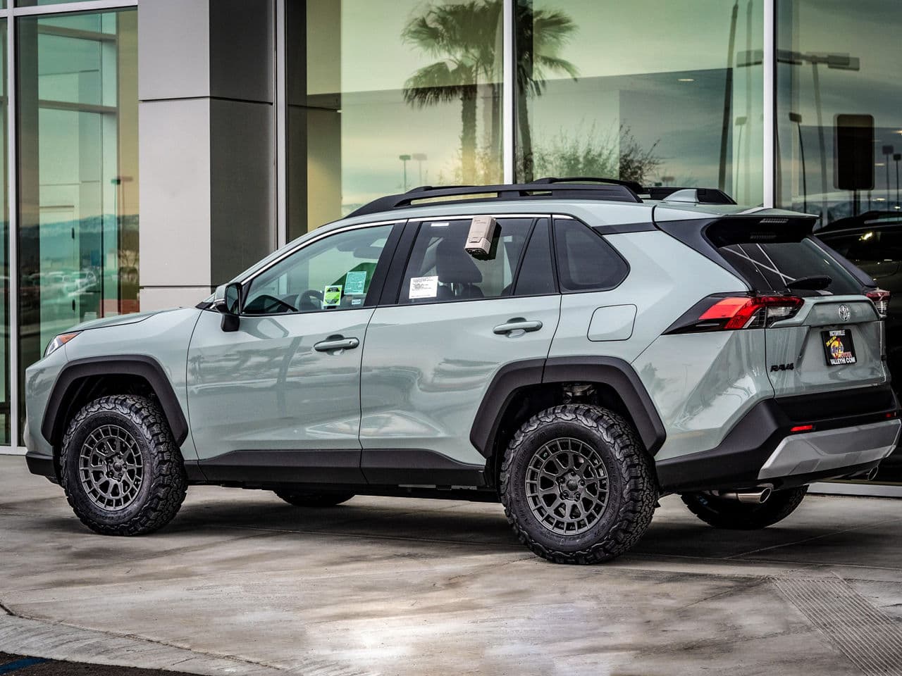 Side profile of 2020 Toyota RAV4 with wheels