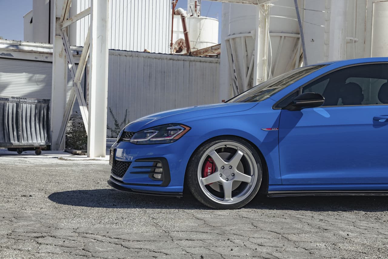 Rear view of 2020 Volkswagen GTI with tuner wheels