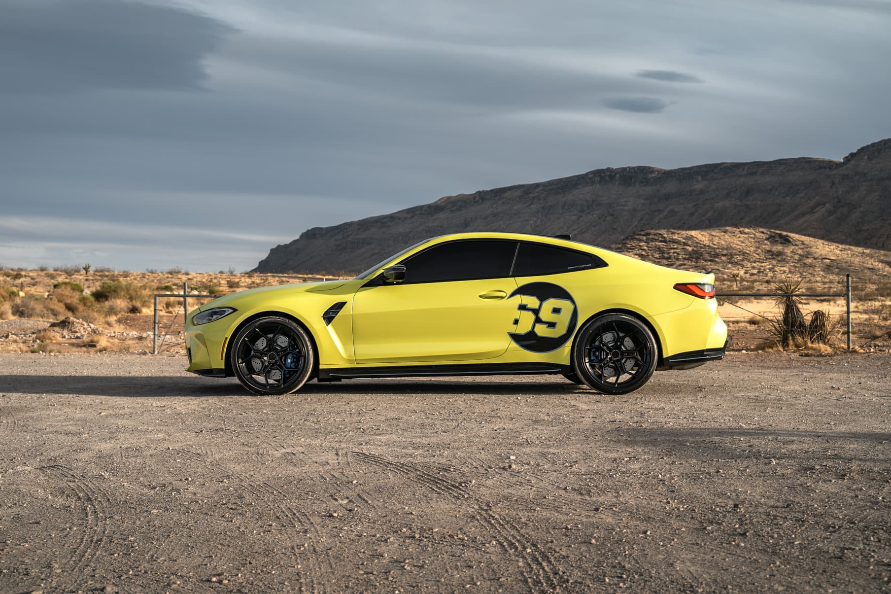 2021 BMW M4 Competition — lowering springs, rear view