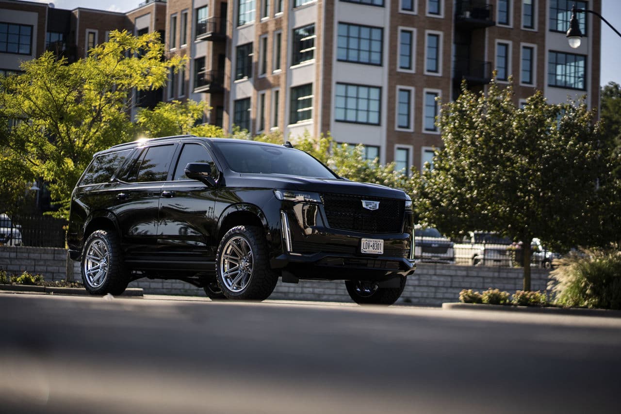 Front view of 2021 Cadillac Escalade with wheels