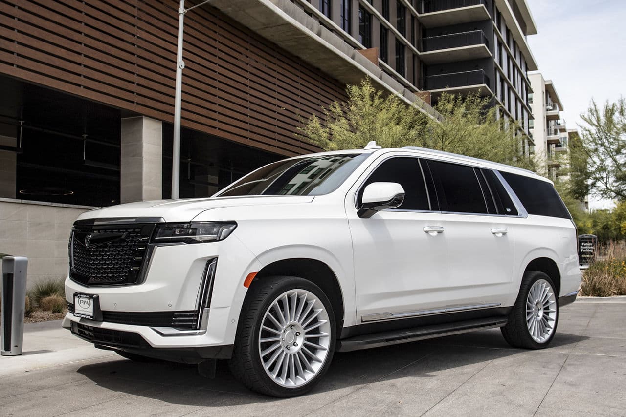 Rear view of 2021 Cadillac Escalade with wheels