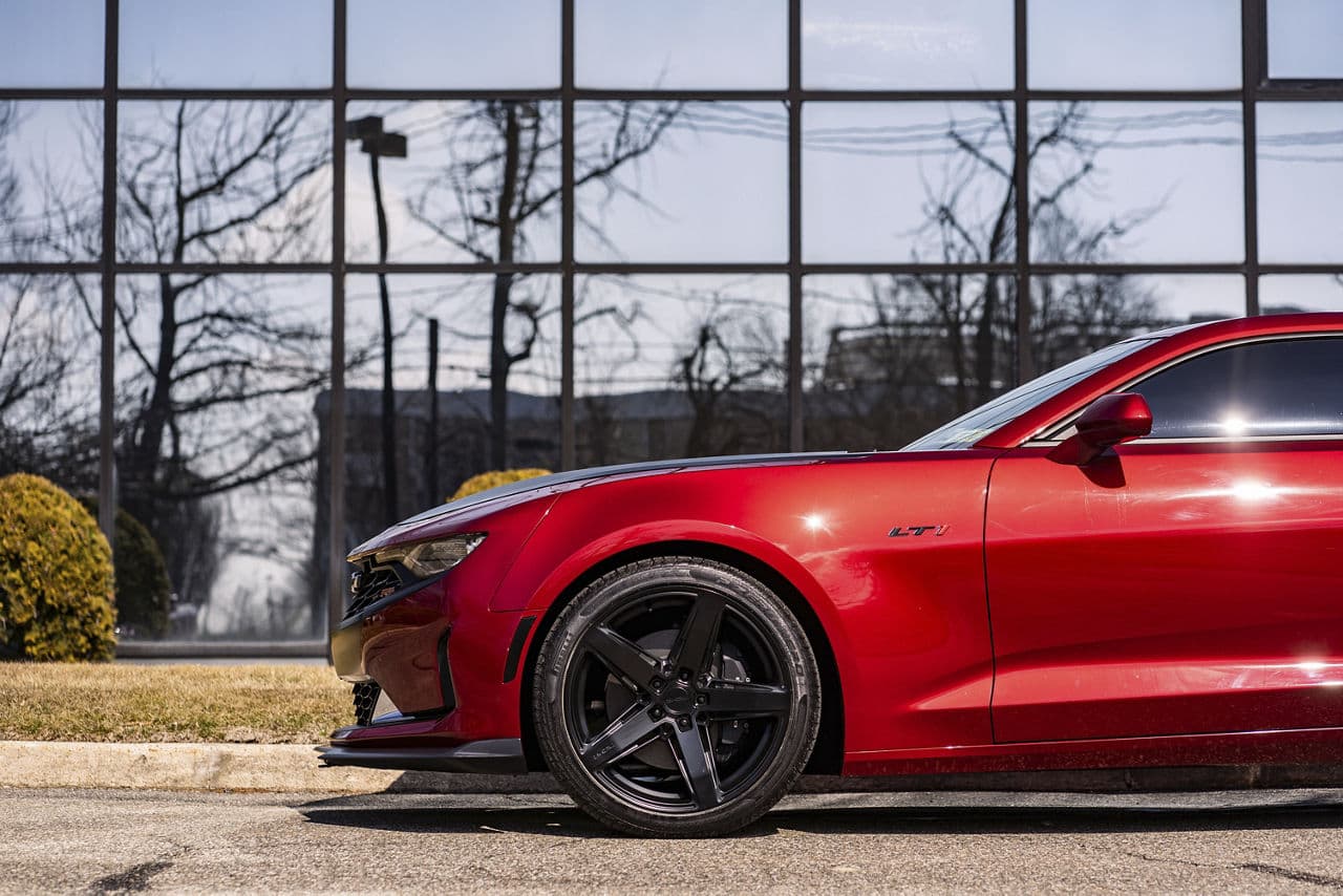 Side profile of 2021 Chevrolet Camaro with wheels