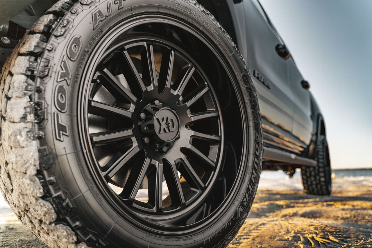Side profile of 2021 Dodge Ram with wheels