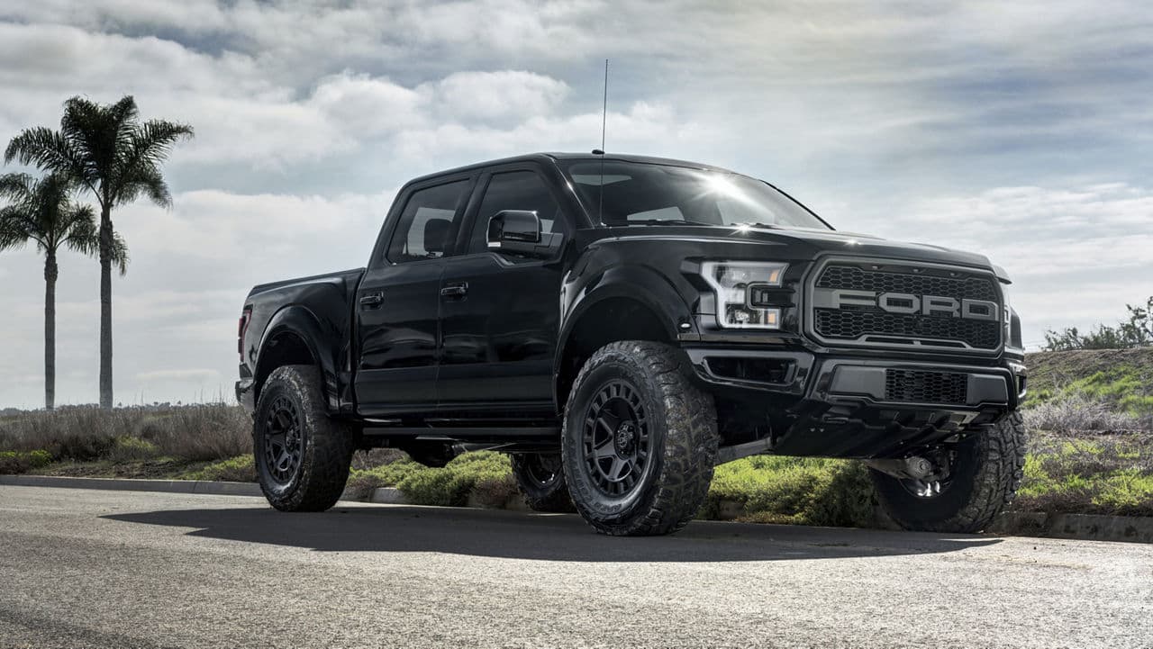 Front view of 2021 Ford F150 Raptor with truck suv wheels