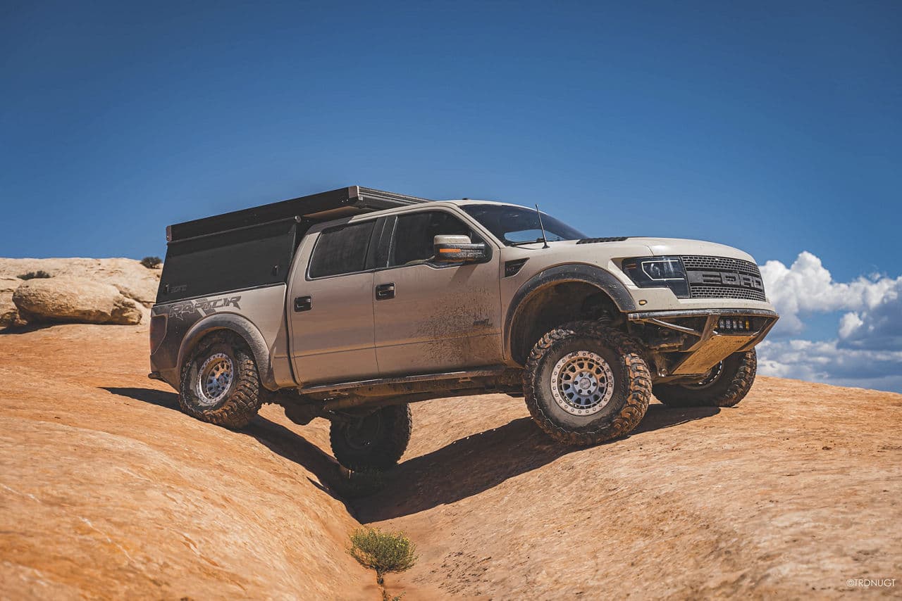 Front view of 2021 Ford F150 Raptor with truck suv wheels