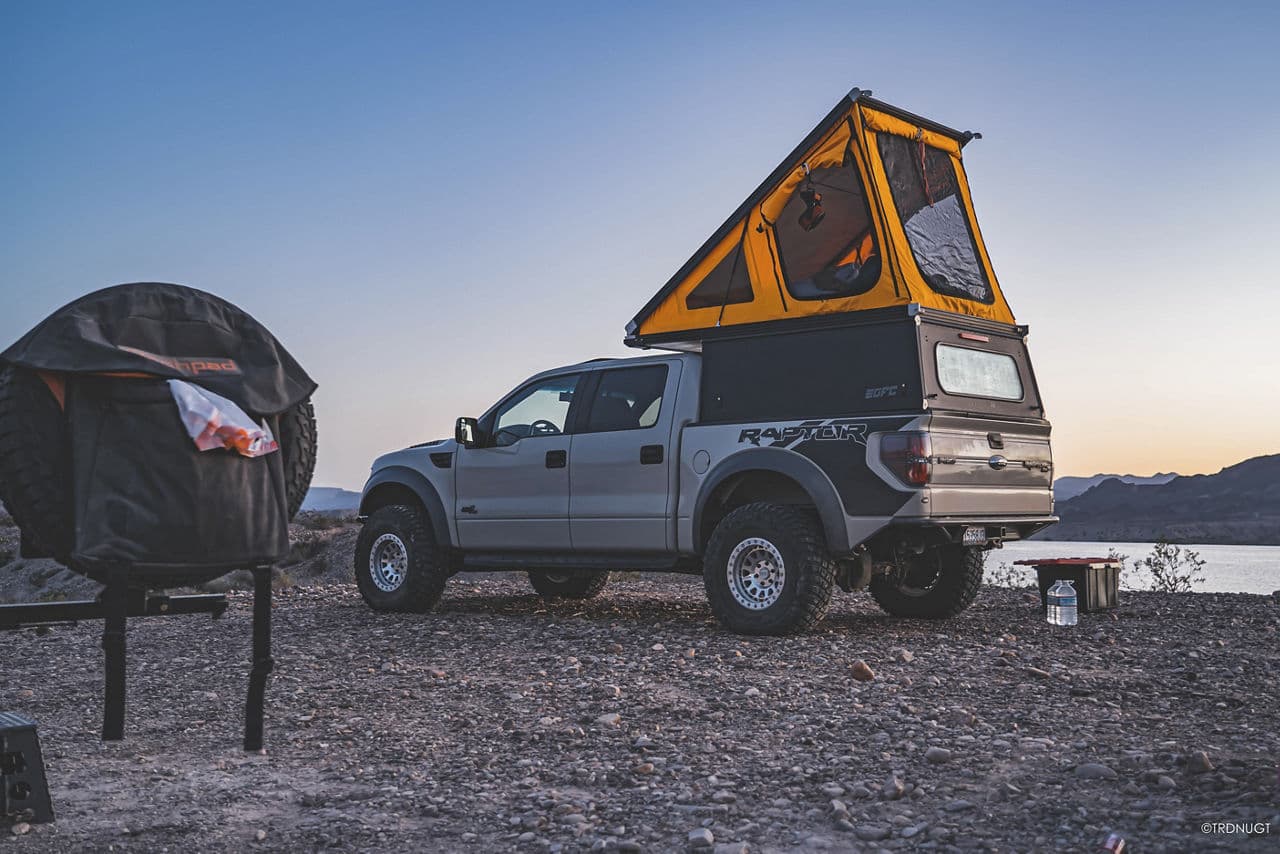 Rear view of 2021 Ford F150 Raptor with truck suv wheels