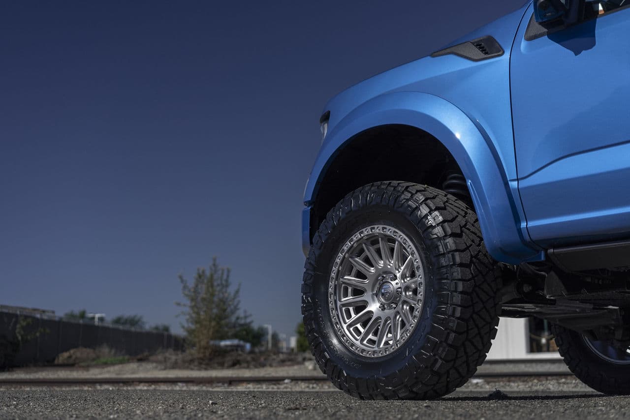 Side profile of 2021 Ford F150 Raptor with wheels