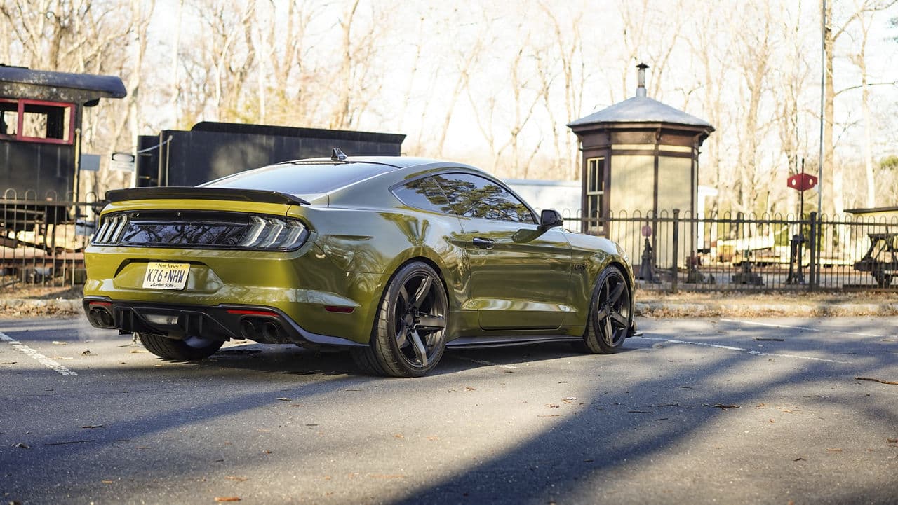 Side profile of 2021 Ford Mustang with wheels