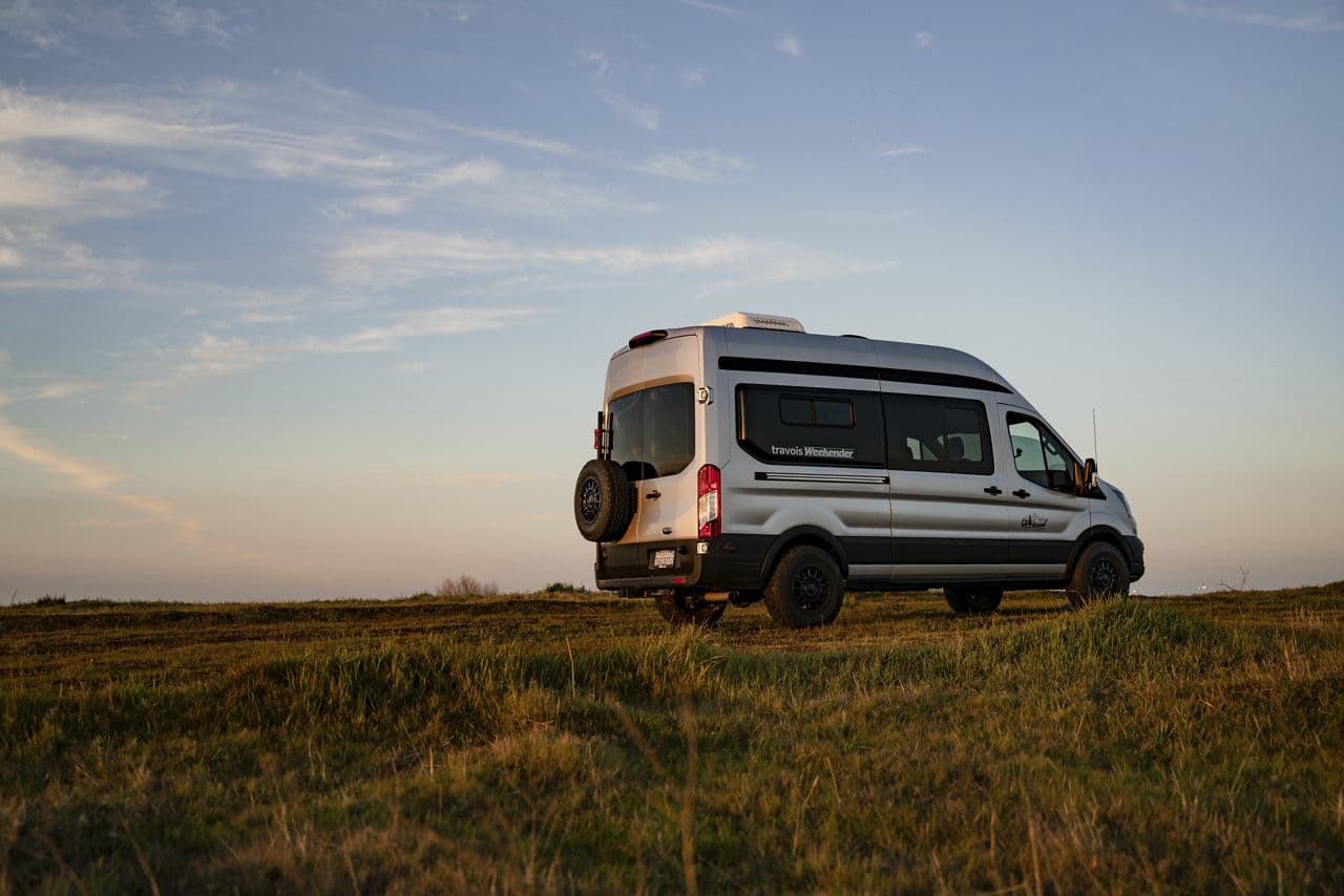 Side profile of 2021 Ford Transit with wheels