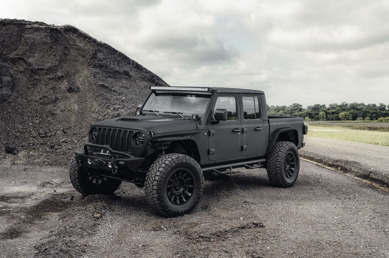 Front view of 2021 Jeep Wrangler with truck suv wheels