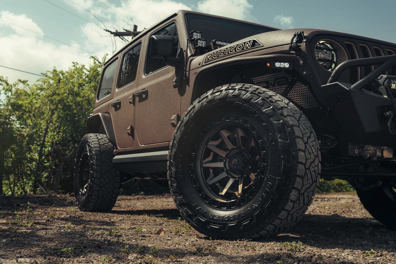 Side profile of 2021 Jeep Wrangler Unlimited Rubicon with wheels
