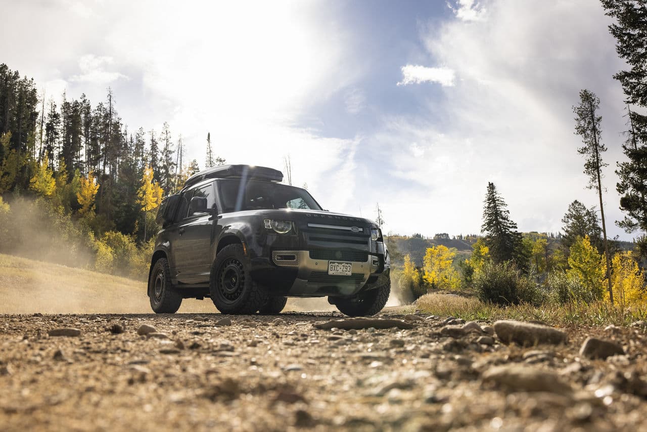 Side profile of 2021 Land Rover Defender with wheels